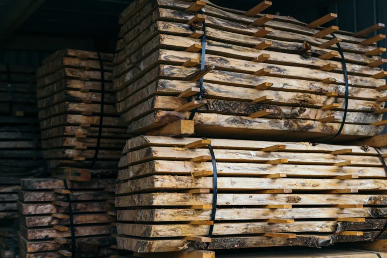 Strapped bundles of sawn lumber stacked in a yard